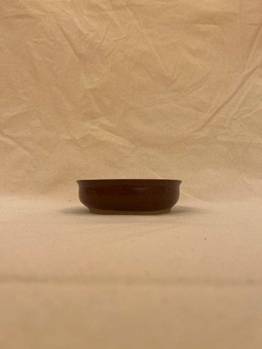 carved plant saucer image 1