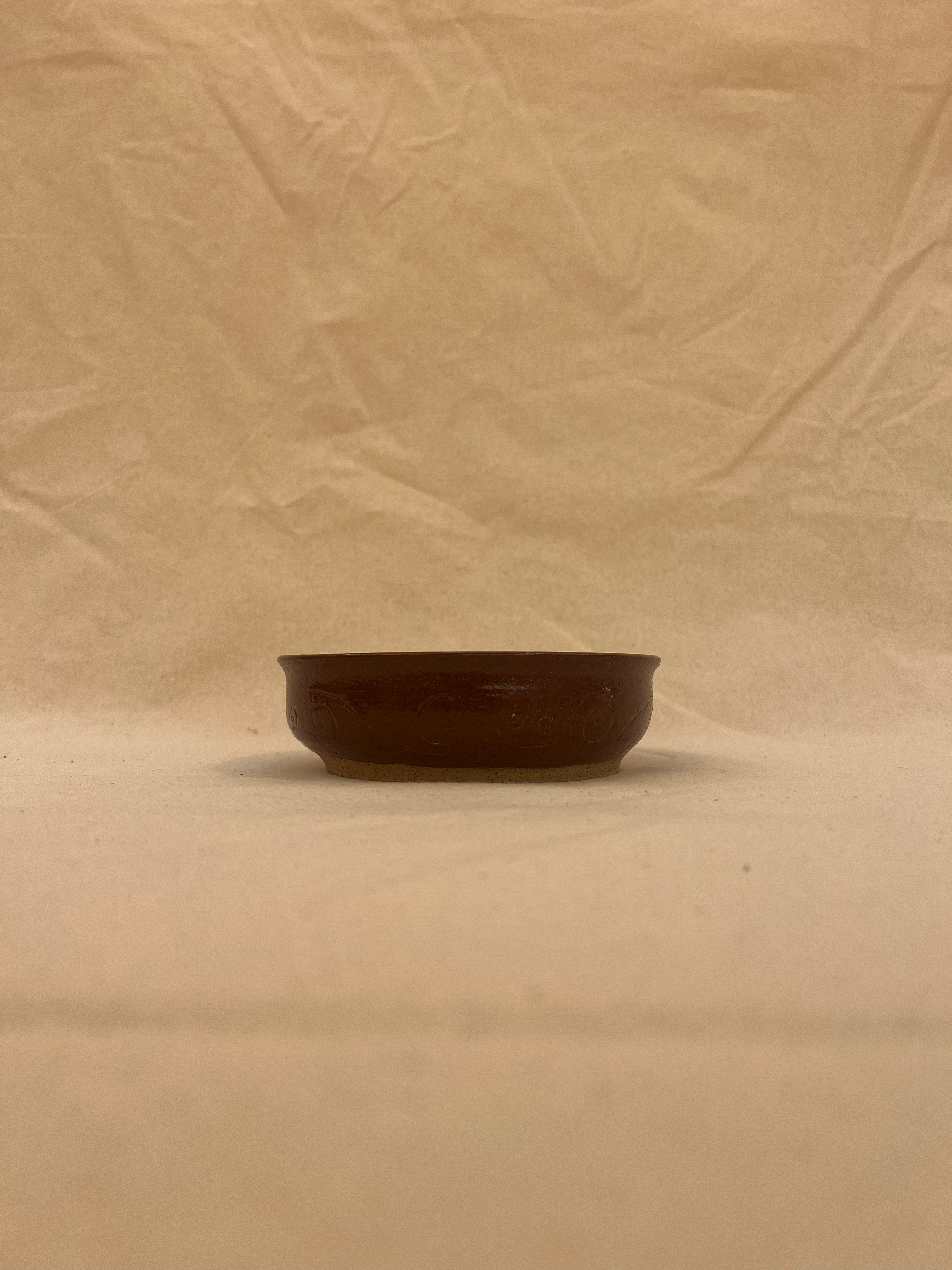 carved plant saucer image 1